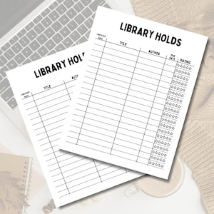 May include: Two printable black and white library tracker sheets. The top sheet is titled "LIBRARY HOLDS" and has columns for title, author, due date, and rating. The bottom sheet is titled "LIBRARY HOLD" and has columns for checkout date, title, and author.