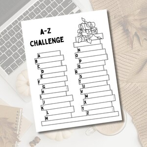 May include: A printable A-Z challenge worksheet with a stack of books and a plant on top. The worksheet is divided into two columns, one for the letters A-M and the other for N-Z. Each letter has a blank space next to it for writing.