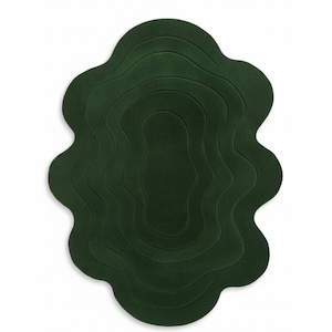 May include: A dark green, organically shaped rug with a layered design. The rug features a series of undulating, wave-like contours, creating a textured, three-dimensional effect. The rug's edges have a soft, flowing shape, adding to its unique aesthetic. This rug is suitable for home decor.