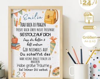 May include: A framed print with a light wood frame features a watercolor illustration of a backpack, apple, and school supplies. The print has text in German, including the name "Emilia" and inspirational phrases. A pencil holder and other stationery items are visible.