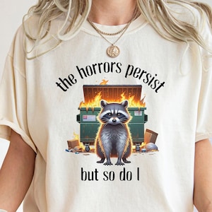 The Horrors Persist But So Do I Shirt, Retro Raccoon Shirt, Sarcastic Shirt, Funny Mental Health, Meme Shirt, Raccoon Shirt,Funny Raccon Tee