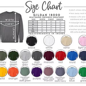 May include: Size chart for Gildan 18000 Heavyblend crewneck sweatshirt. Includes measurements in inches for width, chest, and length for sizes S to 2XL. Features a color palette including black, white, sand, light pink, and more.