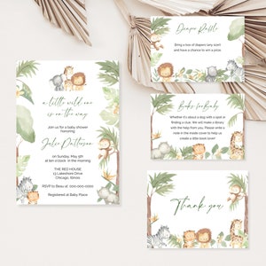 May include: A jungle-themed baby shower invitation with a watercolor illustration of animals, including a zebra, giraffe, monkey, and lion. The invitation reads "a little wild one is on the way" and includes the name "Julie Patterson" and details for the shower.