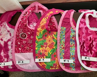 Large Bibs for Seniors  in Multiple themed patterns.  Hand made, double sided w/different patterns and accent edge binding