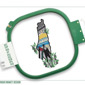 May include: Green embroidery hoop with a white background. The design is a stylized outline of Palestine with the Dome of the Rock in Jerusalem, olive branches, and a Palestinian flag.