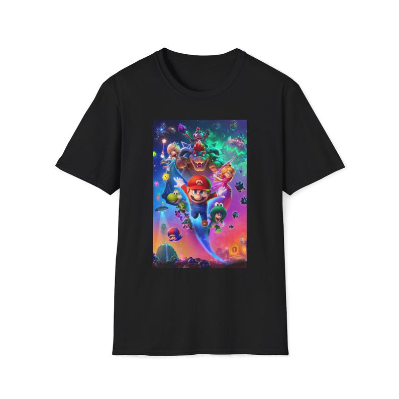 Black Super Mario Galaxy inspired graphic t shirt featuring a colorful cosmic space themed design with a classic platform hero flying through a vibrant galaxy environment surrounded by stars planets and whimsical characters. The shirt is displayed flat showing the full front graphic print on a Gildan 64000 softstyle tee. The bright game inspired artwork captures the fun space adventure aesthetic loved by retro gaming fans.
