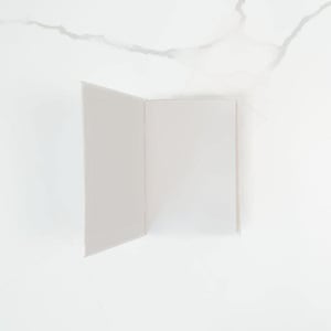 an open book with blank pages against a white background.