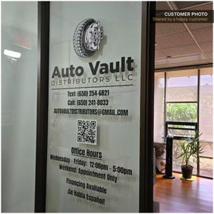 Personalized business window decal with custom company name vinyl lettering for storefront glass