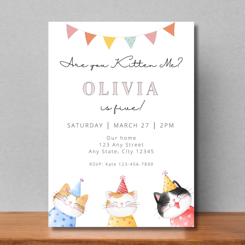 May include: A white invitation with a pink banner at the top. The text reads "Are you Kitten Me? Olivia is five!"  The invitation also includes the date and time of the party, the address, and an RSVP number. The bottom of the invitation features three cartoon cats wearing party hats.