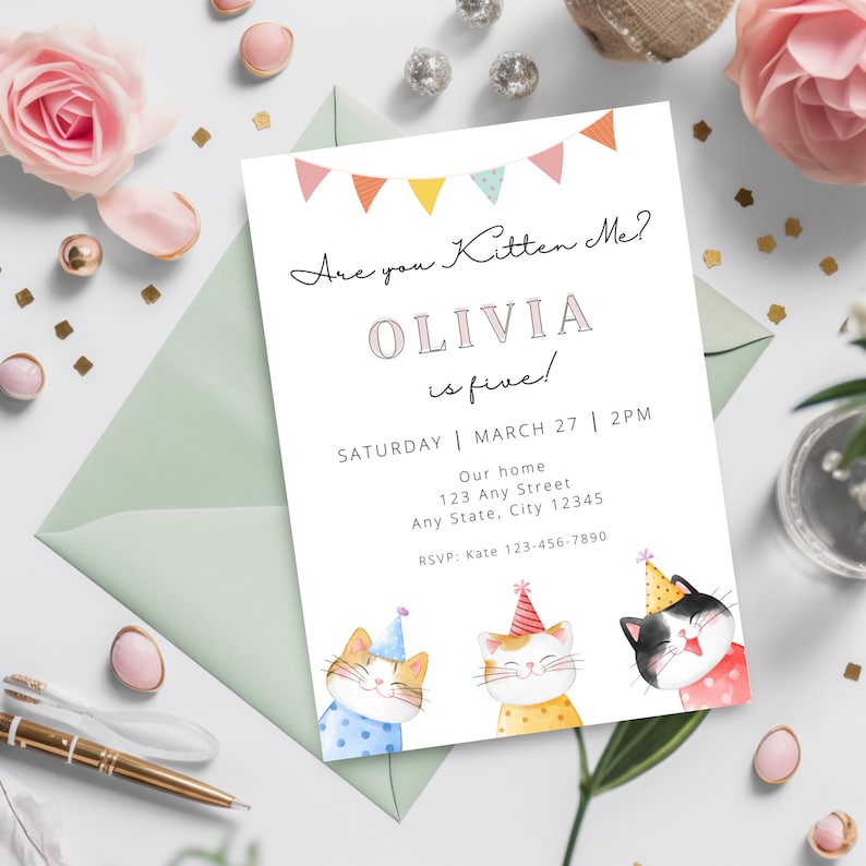 May include: A white invitation with colorful bunting at the top. The text reads "Are you Kitten Me? Olivia is five!"  The invitation details a birthday party on Saturday, March 27th at 2 PM. The address and RSVP information are included. Three cartoon cats with party hats are at the bottom of the invitation.
