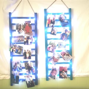 Repurposed Wood Ladder Photo Display: Vintage Crib Frame with Fairy Lights
