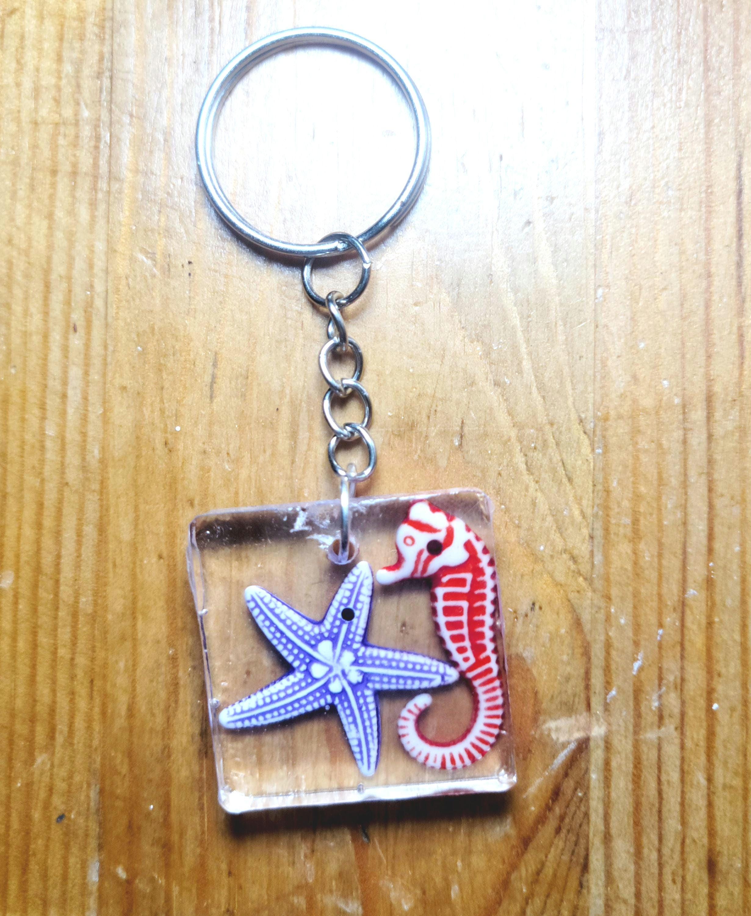Seahorse and starfish resin keychain