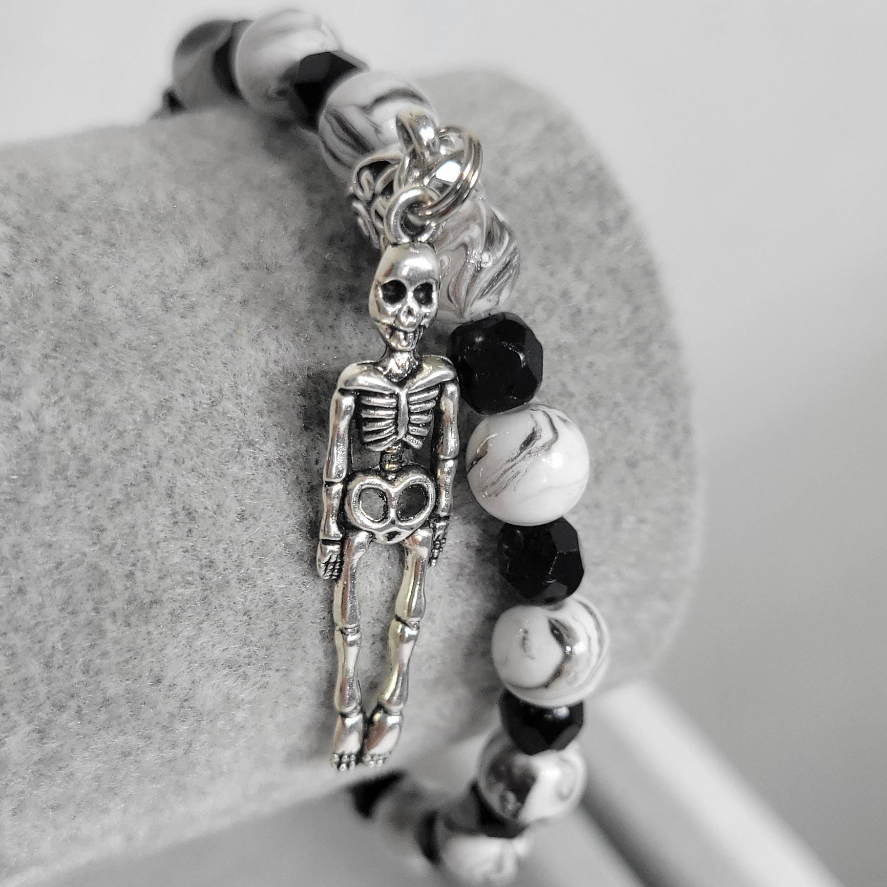 Hand crafted black & white crackle beaded skeleton charm bracelet