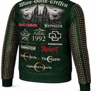 May include: Dark green leather jacket with gold stud detailing on the sleeves. The back displays a gothic castle design and band logos such as Iron Maiden, Rammstein, and Slipknot. The text "Wave-Gotik-Treffen" is visible.