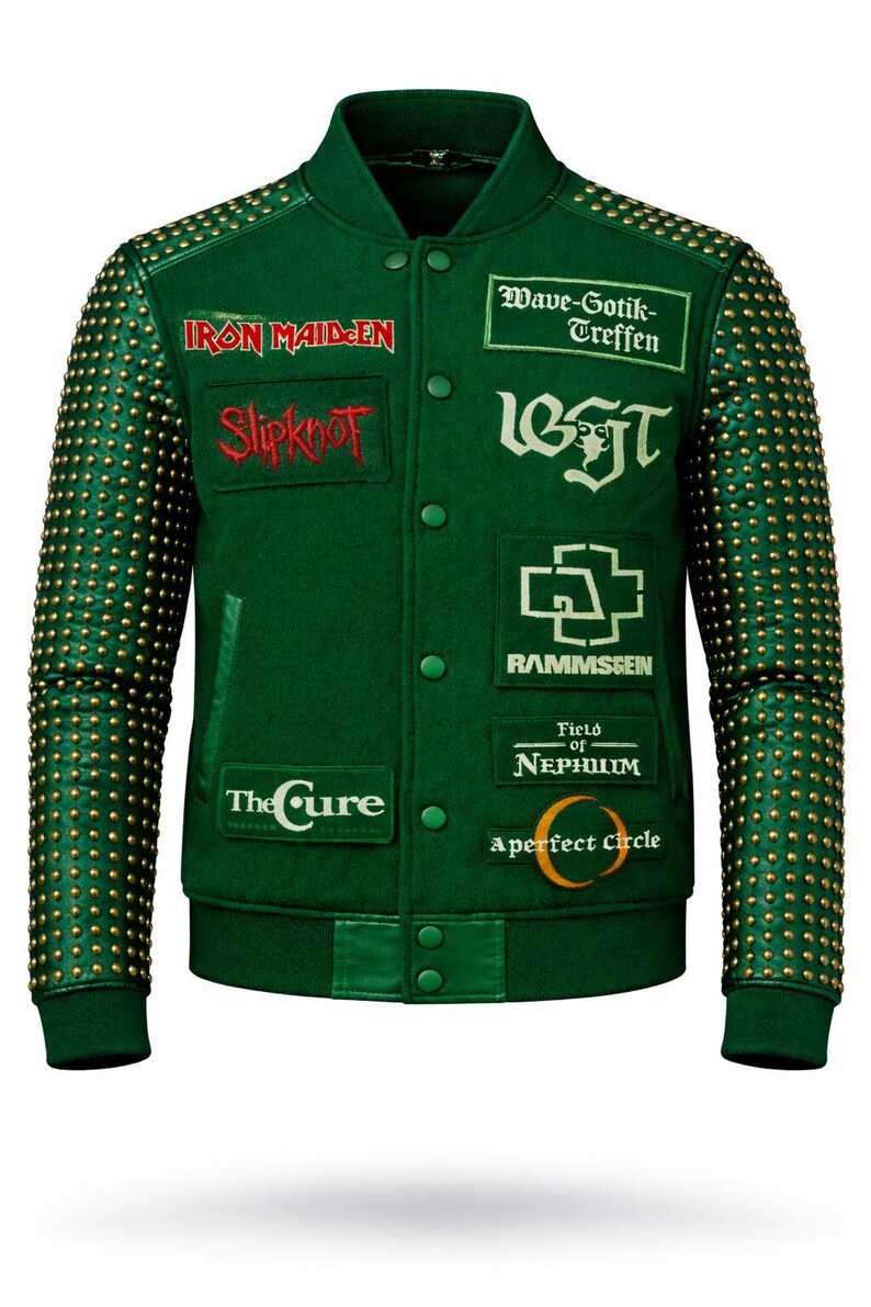 May include: Green varsity jacket with gold stud detailing on the sleeves. Features patches with band names including Iron Maiden, Slipknot, and The Cure. The jacket has a button-up front and ribbed trims.