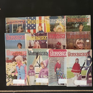 May include: A collection of vintage "Workbasket" magazines, featuring various covers with images of people and craft projects. The magazines have a retro aesthetic, with text and illustrations. The covers showcase different themes and styles from the era.
