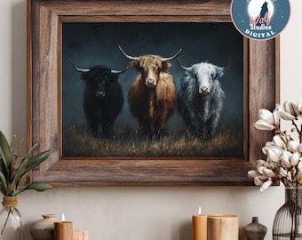 May include: A framed print featuring three Highland cows in a field. The cows are black, brown, and gray, with long horns and shaggy fur. The artwork is set against a dark, moody background, and the frame is made of wood.