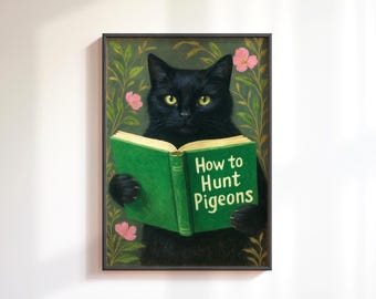 May include: Framed art print featuring a black cat with yellow eyes reading a green book titled "How to Hunt Pigeons." The background has a floral design with pink flowers and green leaves.