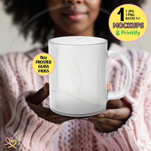 May include: A white frosted glass mug with a 11oz capacity. The mug is being held by a person wearing a pink sweater. The text "11oz FROSTED GLASS MUGS" is visible on a yellow sticker.