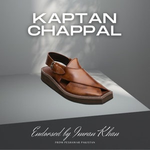 May include: Brown leather sandals with a buckle strap and a thick sole. The sandals are called "Kaptan Chappal" and are endorsed by Imran Khan. The text "From Peshawar Pakistan" is also included.