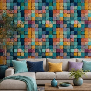 May include: A living room scene featuring a beige sectional sofa with colorful throw pillows in teal, navy, and yellow. A wooden coffee table holds decorative items. The wall is covered in a mosaic of colorful square tiles in shades of blue, yellow, and orange.