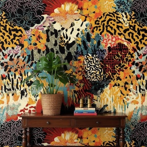 May include: A vibrant, abstract wallpaper design featuring a collage of floral and animal print patterns in a mix of colors including black, yellow, orange, and blue. A dark wooden table holds a potted plant, books, and binoculars.