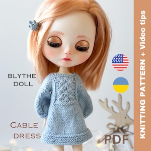 May include: Knitting pattern for a blue cable knit dress for a Blythe doll. The pattern includes instructions in English and Ukrainian, and a video tutorial. PDF download.