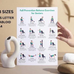 May include: A white poster titled "Fall Prevention Balance Exercises for Seniors" with illustrations of exercises. The poster is held by a hand, and next to it is a white ceramic vase and a stack of stones. The poster is available in US Letter, Tabloid, and A4 sizes.