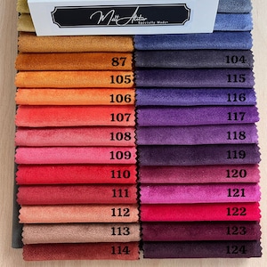 May include: A swatch card with 17 fabric samples in various shades of orange, red, pink, purple, and blue. The swatches are numbered 87 to 114 and 104 to 124. The card is labeled "Melt Atelier, Specially Made."