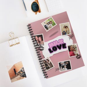 Könnte beinhalten: Ein rosa Spiralnotizbuch mit einer Collage von Fotos und den Worten "MILK LOVE" in Lila und Schwarz. Das Notizbuch hat ein zerrissenes Papierdesign und dekorative Elemente wie Lippenstiftküsse und den Text "xoxo".