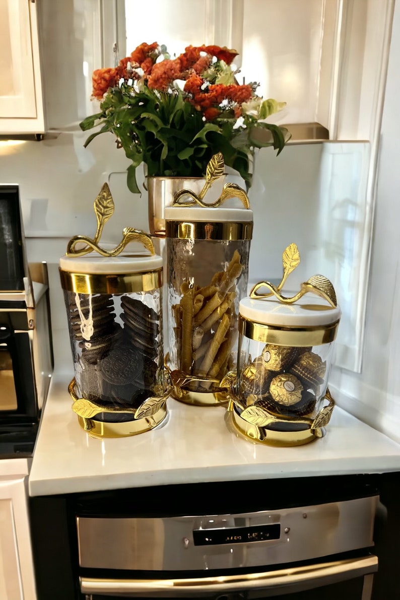 Hammered Glass Canister With Gold Metal Leaf Branch & Marble Lid
