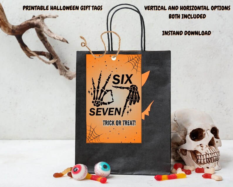 May include: A black gift bag with a Halloween-themed tag that reads "SIX SEVEN TRICK OR TREAT!" in black text on an orange background. The tag features skeleton hands and spiderwebs. The bag also has the text "PRINTABLE HALLOWEEN GIFT TAGS" and "VERTICAL AND HORIZONTAL OPTIONS BOTH INCLUDED INSTAND DOWNLOAD".