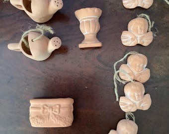 Mini ornements en terre cuite