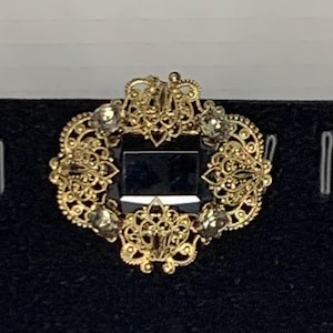 VTG West-Duitsland filigraanbroche zwarte en grijze glassteentjes