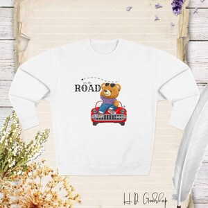 Hit the Road in Style with Our 'On the Road' Teddy Bear Sweatshirt Design - Perfect for Adventurers Who Love Comfort, Exploration!