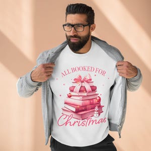 Cozy Up This Holiday Season with Our &#39;All Booked for Christmas&#39; Sweatshirt - Perfect for Book Lovers Who Love Celebrating Christmas in Style