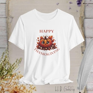 Saison der Dankbarkeit mit Stil mit unserem Happy Thanksgiving T-Shirt: Eine herzerwärmende und klassische Art, den Weihnachtsgeist mit der Familie zu umarmen!