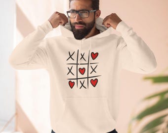 A Cozy Valentines Hoodie with a Playful 'XOXO' Design, Perfect for Sending Hugs, Kisses, and Love This Valentines Day and Beyond!