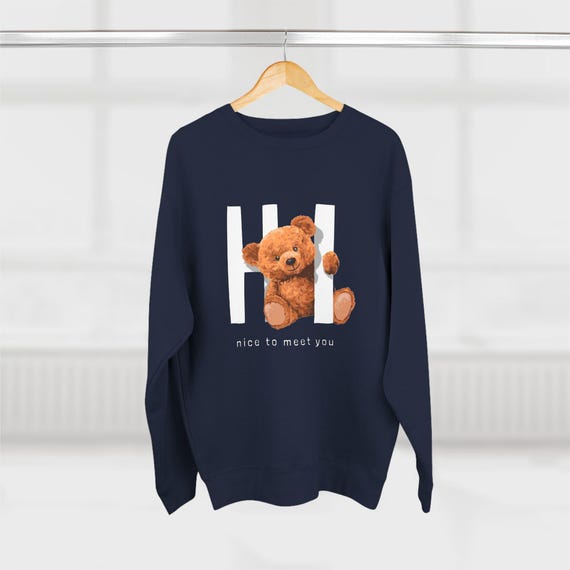 Reciba cálidos saludos con nuestra acogedora sudadera con osito de