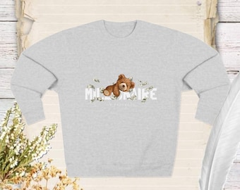 Sudadera con osito de peluche &quot;Millonario en progreso&quot;: ¡sueña en grande con un toque acogedor! Este diseño divertido y motivador aporta encanto y comodidad.