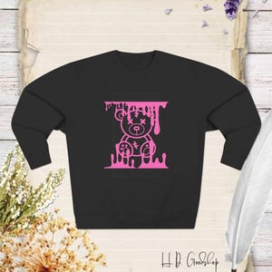 Embrace Cuteness and Comfort with Our Adorable Teddy Bear Sweatshirt Design - Perfect for Cozy Days and Heartwarming Moments!
