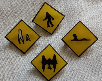 Cryptid Crossing Sign Pin