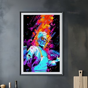 Könnte beinhalten: Ein gerahmter Druck eines farbenfrohen abstrakten Porträts einer Person mit Sonnenbrille und einem blauen Hemd. Der Hintergrund ist schwarz mit Spritzern von orangefarbener, rosa, violetter und gelber Farbe.
