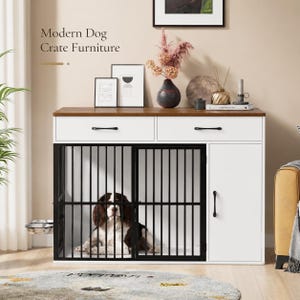 Puede incluir: Un mueble jaula para perro de madera blanca y marrón con dos cajones superiores con tiradores negros, un recinto de barrotes de metal negro con un perro marrón y blanco, y una puerta lateral. Texto: Modern Dog Crate Furniture.