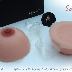 Silicone Breast Forms  Bra that is made from a pair of Softleaves E100 Silicone Breast Forms in Round Shape,  pads, travel box, tape