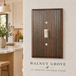 May include: A rectangular dark brown wooden light switch plate with a vertical ribbed texture. The plate features a single central toggle switch and two silver screws. Below the plate, the text reads WALNUT GROVE UV PREMIUM TEXTURED FINISH.
