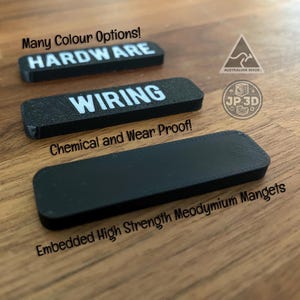 May include: Black rectangular magnets with white text reading "HARDWARE" and "WIRING". The magnets are labeled "Chemical and Wear Proof!" and "Embedded High Strength Meodymium Mangets". The image also includes the text "Many Colour Options!" and an Australian Made logo.