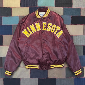 May include: A set of three ceramic mugs with a speckled, matte finish. Each mug features a different color: light blue, cream, and gray. The mugs have a simple, modern design and a comfortable handle. Perfect for coffee or tea.