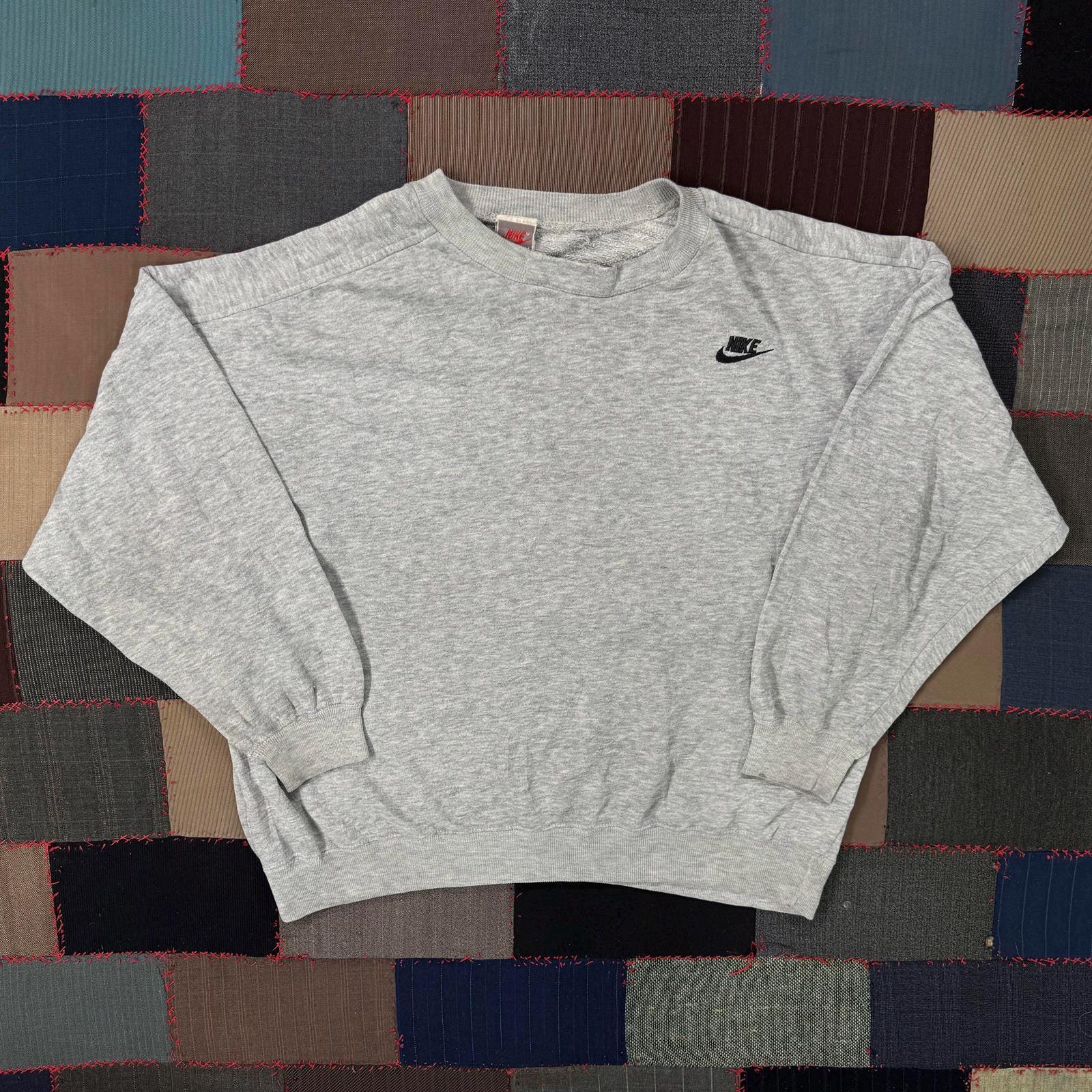nike small tick sweatshirt