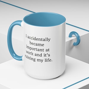 Funny Sarcastic Work Mug: I Accidentally Became Important Light Blue